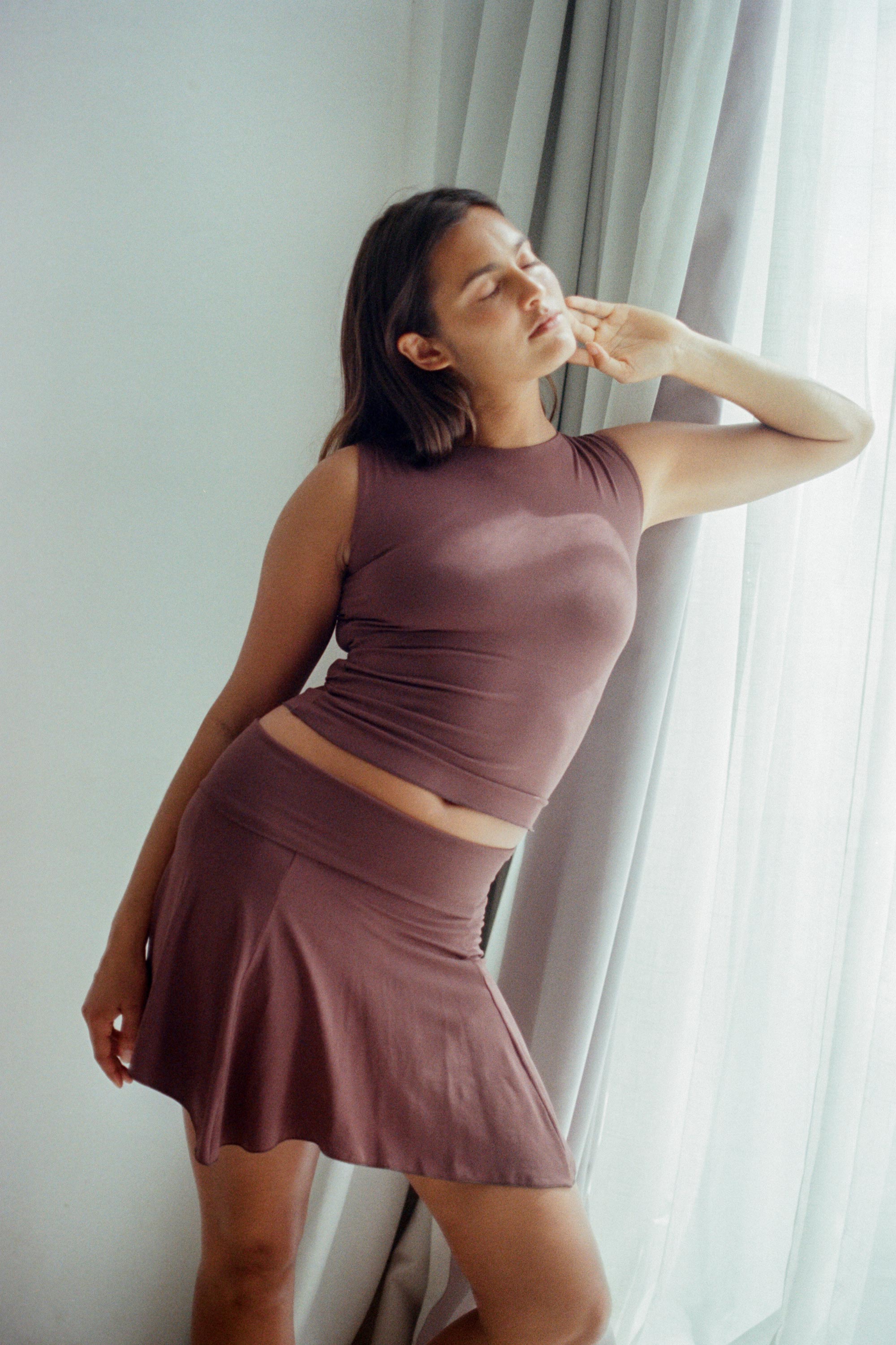 Haley is wearing size S/M. Bust 87cm (34.25”), Waist 63cm (24.8”), Hips 92cm (36.22”), Height 172cm (5.6”) | Size S/M